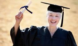 senior woman in cap and gown