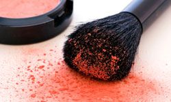 A puffy blush brush is great for applying color to the apples of your cheeks.