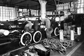 At the Highland Park Plant in 1913, Henry Ford introduced the first moving assembly line for cars. Within 18 months it took only 1.5 man-hours to build a Model T.