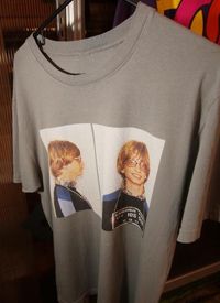 A T-shirt from Microsoft's clothing line features a photo of Microsoft chairman Bill Gates' infamous 1977 mug shot.