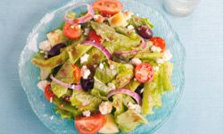 Traditional Greek salads don't have lettuce, but feel free to add some green leaves if you want to.