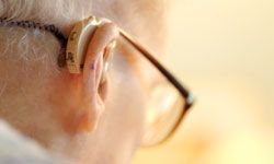 Hearing aids amplify sound, but they don't clarify it. 