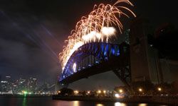 Fireworks shoot from the Sydney Harbor Bridge.