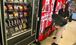 Students purchase soft drinks from vending machines at Jones College Prep High School April 20, 2004, in Chicago, Ill. We know soda's loaded with sugar, but did you know it's a high-sodium beverage, too?
