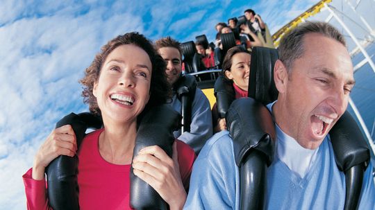 What makes a roller coaster a 'mega coaster'?