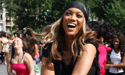 While she's participating in a dance flash mob in this picture, model Tyra Banks shows similar enthusiasm for petroleum jelly. See more pictures of beautiful skin.