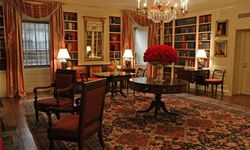 The White House library, above, is one of 132 elegant rooms in the president's residence.