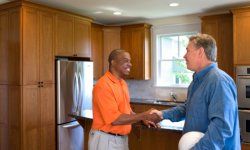 man shaking hands with his contractor