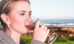 young woman drinking wine