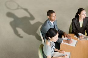 tennis player at a business meeting