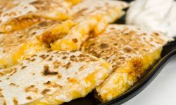 Quesadillas are cheesy, cheap and delicious. 