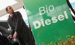 A man fills his car's tank with gasoline at a gas station that also sells biofuels on April 7, 2008 in Berlin, Germany.