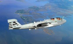 An EA-6B Prowler from the Salty Dogs of Air Test and Evaluation Squadron 23 flies over Southern Maryland. The plane uses a biofuel blend of JP-5 aviation fuel and camelina oil. The Prowler successfully completed its inaugural biofuel flight.