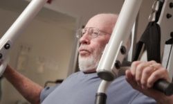 older man on circuit machine