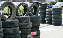 New tires are displayed outside of a tire shop in San Jose, Calif.