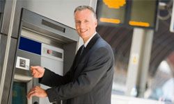 man using ATM