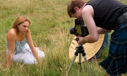 Sometimes a photographer or the photographer's assistant uses a white or metallic cloth stretched over a frame to reflect light onto the subject.