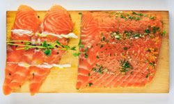 Sliced salmon on slab