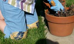 Playing in the dirt? Tie some plastic bags on to keep your knees clean and dry.