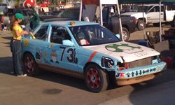 The 24 Hours of LeMons race organizers only allow clunkers onto the track. If you paid more than $500 for your car, you'll have to pay a lap penalty.