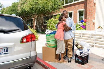 Student moving into dorm. 