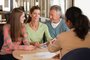 Financial aid advisor with family.