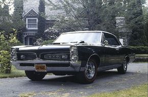 ©The 1967 Pontiac GTO, with its distinctive grille, is oneof the most imposing muscle cars ever built. See more muscle car pictures.