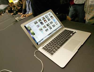 A new MacBook Air ultra thin laptop sits on display at the MacWorld Conference & Expo. 