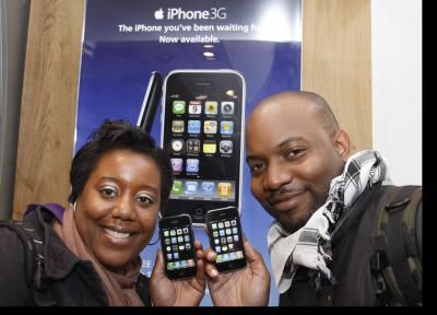 Phyllisea Jones and Dean Peltier are first people to buy a new iphone 3G at the O2 store in Oxford Street on July 11, 2008 in London, England. Phyllisea and Dean were first in line after waiting outside the store since 7 O'Clock the previous evening.